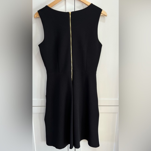 Ricki’s Sleeveless High Neck Fit & Flare Dress - Picture 2 of 3